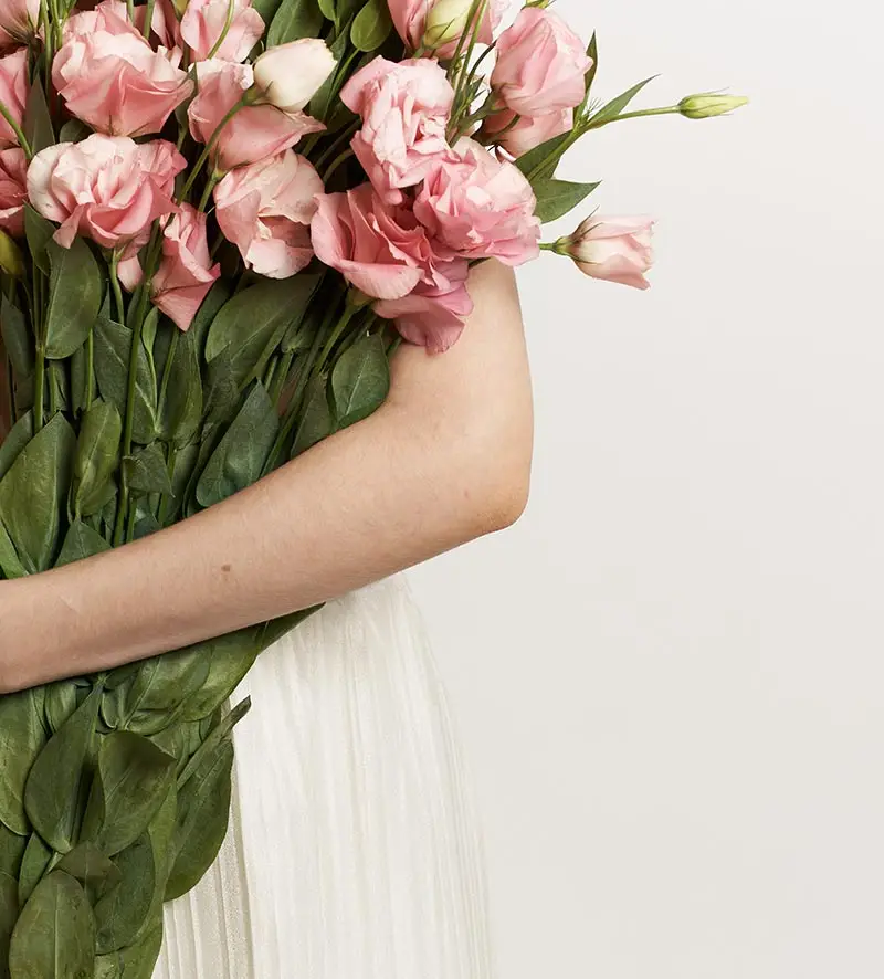 Holding Pink Lisianthus
